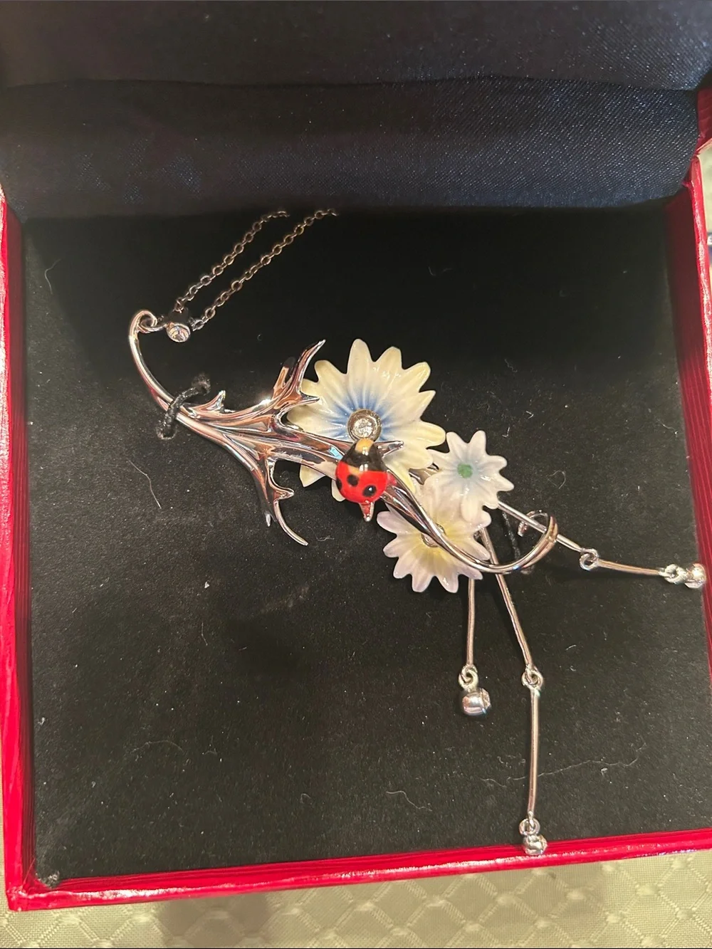 FRANZ Silver Floral Ladybug Drop Necklace in White and Red